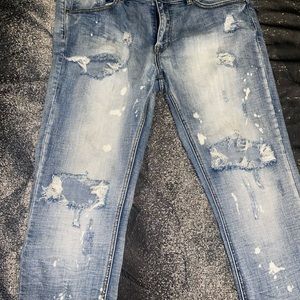 Distressed blue jeans